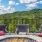 outdoor seating are with firepit and many trees