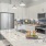 kitchen with large island with stainless steel appliances
