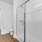 glassed, walk-in shower in bathroom