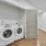 side-by-side washer/dryer units in laundry closet
